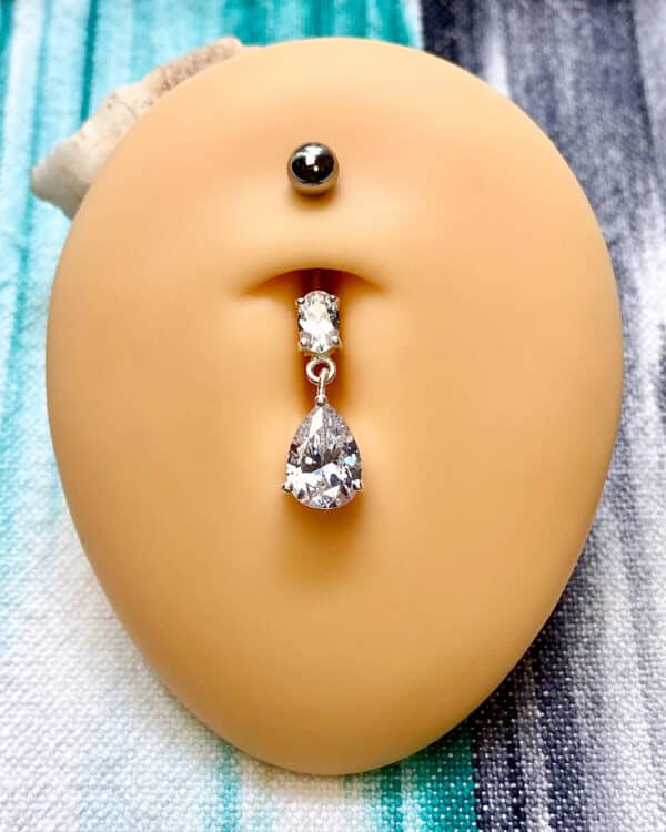 Banane nombril diams et pendentif pierre blanche